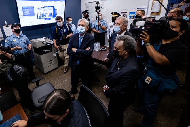U.S. Attorney General Merrick Garland listens to a presentation with Senator Dick Durbin (D-IL) and Chicago Mayor Lori Lightfoot while he is at the Chicago Police Department's Strategic Decision Support Center in Chicago, Illinois on July 22, 2021 , visited.