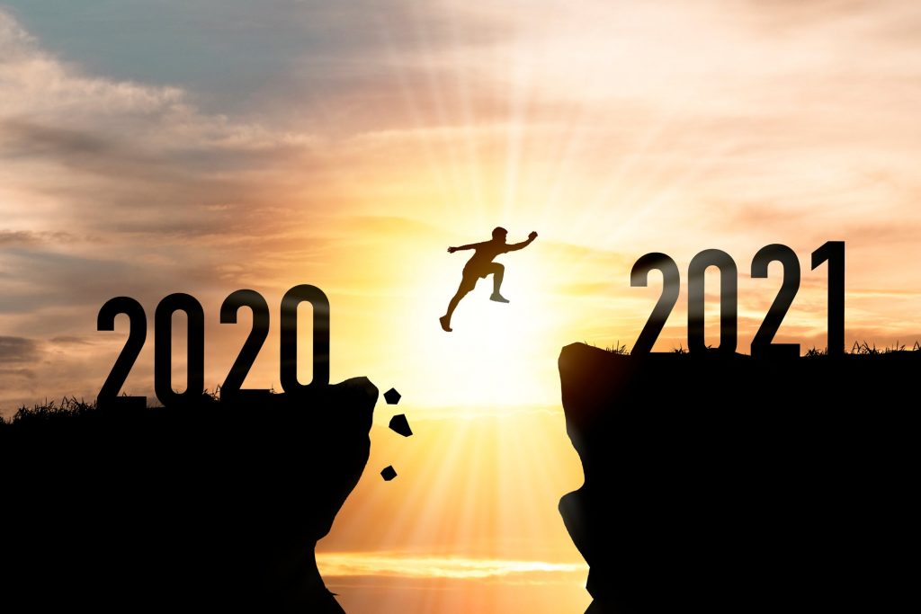 Person jumping from 2020 to 2021