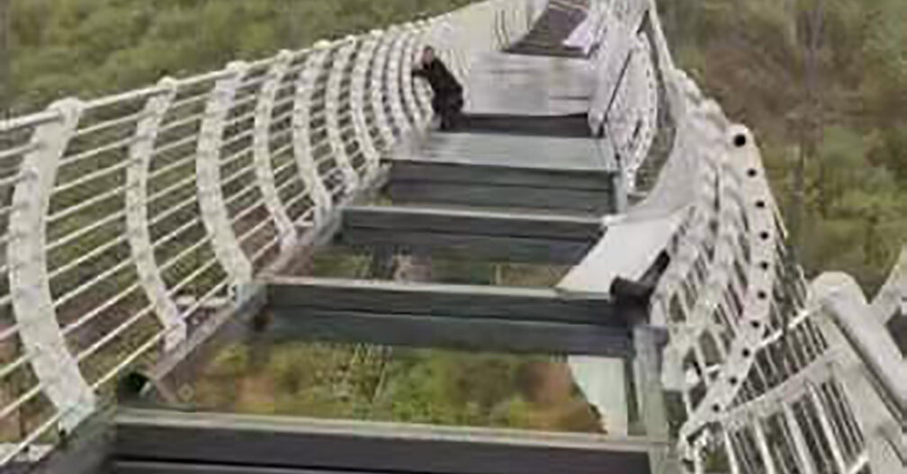 Man Hangs On for Life After Winds Shatter Glass Bridge in China