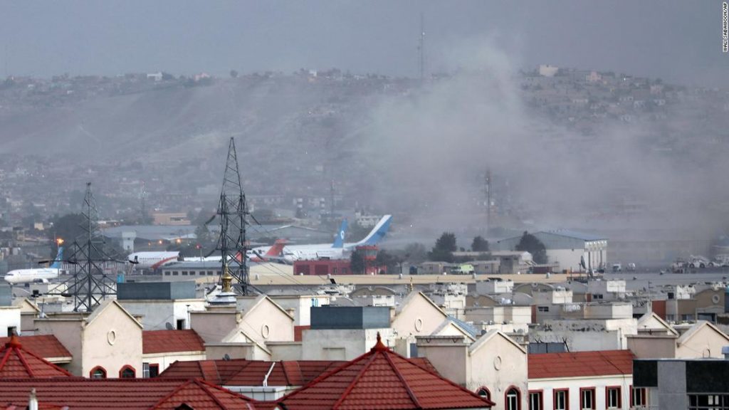 Latest on blasts reported outside Kabul airport